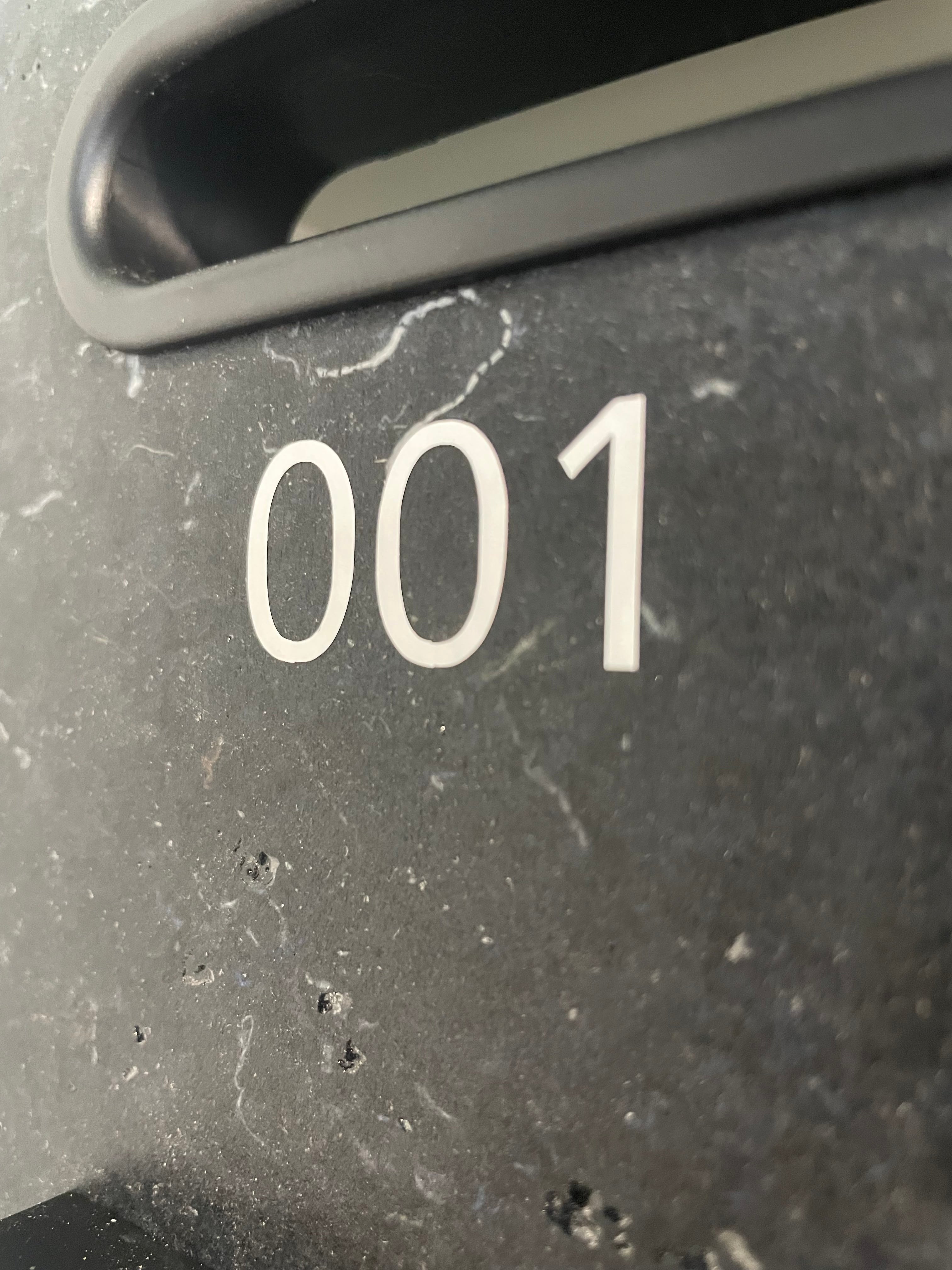 Sticker met kluisnummer