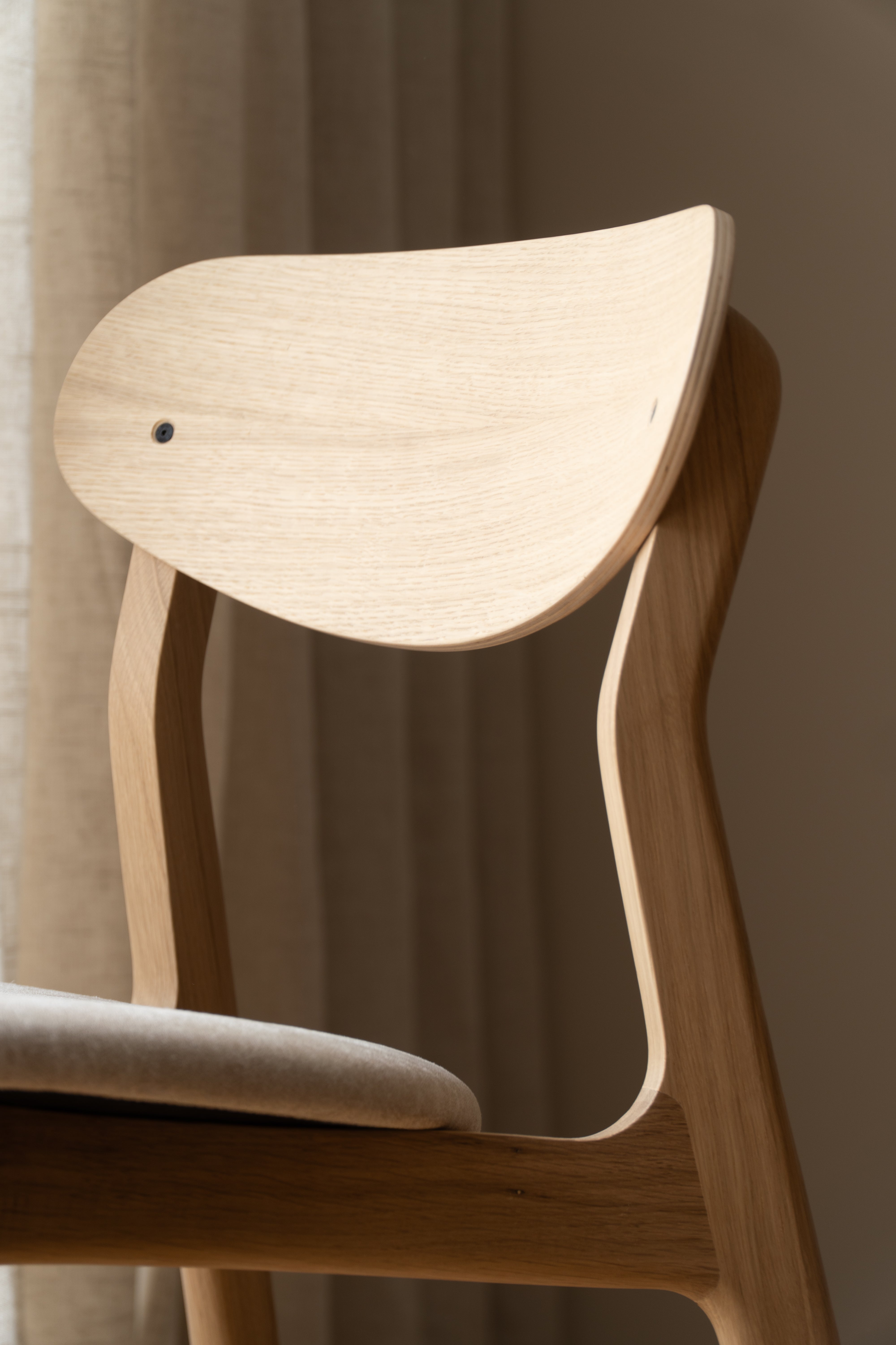 Ubu Chair half upholstered